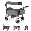 Gray foldable wagon stroller for 2 kids, featuring padded back support and drop-down footwell for added comfort.