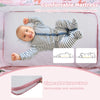 Folding baby bassinet with a comfortable mattress, adjustable heights, and detachable side rail for easy breastfeeding.