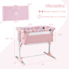 Folding baby bassinet bedside sleeper in pink with adjustable height, detachable side rail, and carry bag for easy.