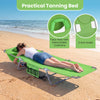 Folding beach lounge chair in lawn-green with face hole, adjustable backrest, and side storage pocket for versatile.