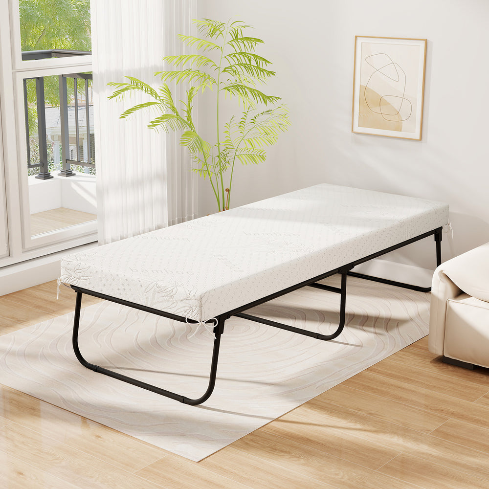Folding bed with memory foam mattress, 75 x 31 inches, ideal for guest rooms or camping, featuring a sturdy metal frame.