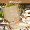 Lightweight folding camp chair with ergonomic design, cozy armrests, and wide seat for ultimate comfort at the beach.
