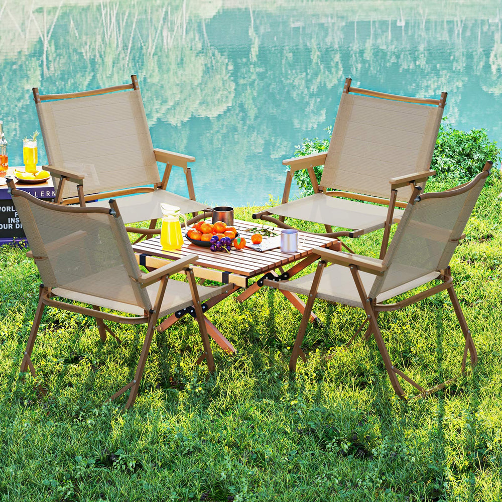 Set of two lightweight folding camp chairs in beige, perfect for beach or backyard use with ergonomic design and.