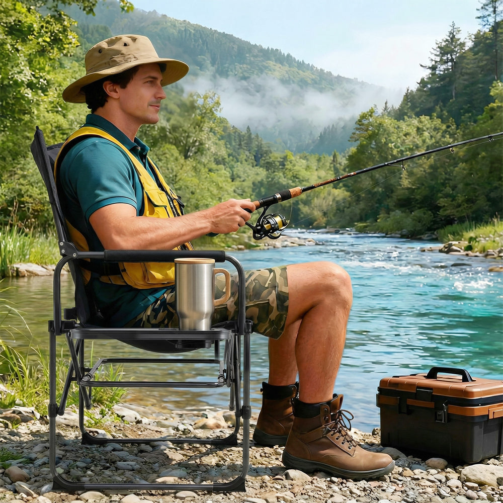 Folding camping chair with side table and cup holder, featuring heavy-duty construction for fishing and outdoor use.