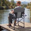 Folding camping chair with cup holder and storage pocket, featuring a sturdy metal frame and breathable mesh for.