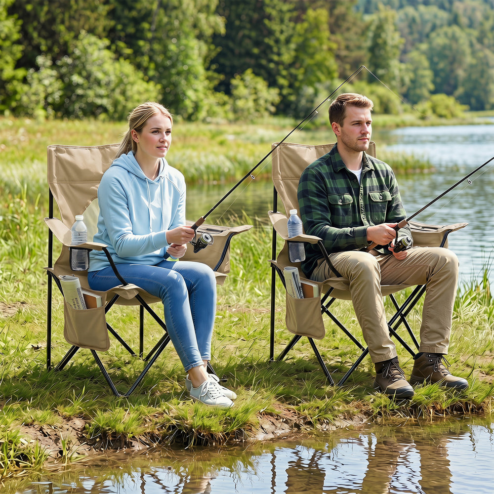 Two people sitting in green folding camping chairs with mesh backrests, perfect for fishing or outdoor relaxation.