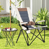 Folding camping chair with cup holder armrest and lumbar pillow, featuring breathable fabric and sturdy metal frame.