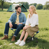 Folding camping stool with 360° swivel and anti-sink feet, perfect for outdoor events and easy to transport.