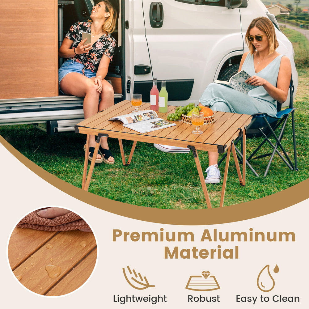 Folding camping table in brown with waterproof surface, portable bag, and stable frame for picnics and outdoor.