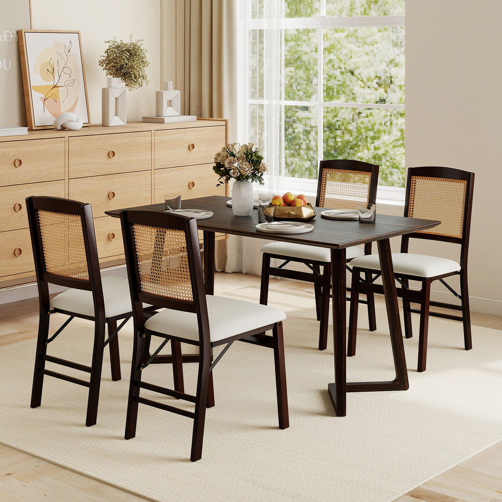 Set of 4 folding rubber wood dining chairs with linen padded seats and rattan backrests, ideal for dining rooms.