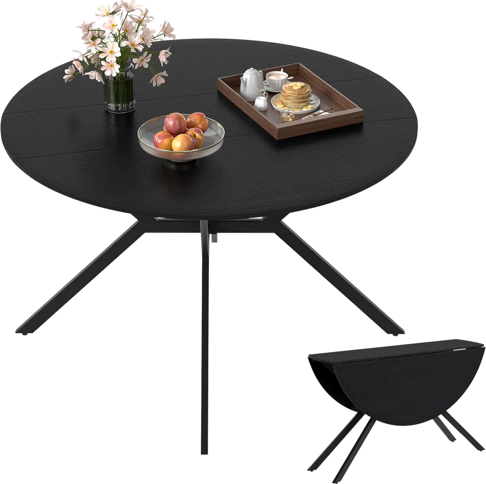 Round black folding dining table with drop leaves, versatile for small spaces, featuring an X-shaped metal frame.