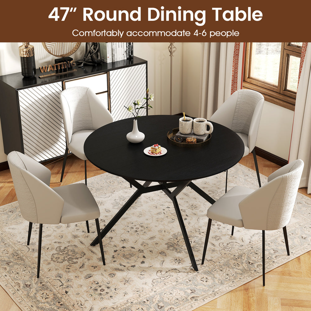 47" round folding dining table in black with drop leaves, ideal for compact spaces, comfortably seats 4-6 people.
