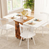 Folding dining table with a brown wood-like finish, featuring drop leaf design and lockable wheels for versatile use.