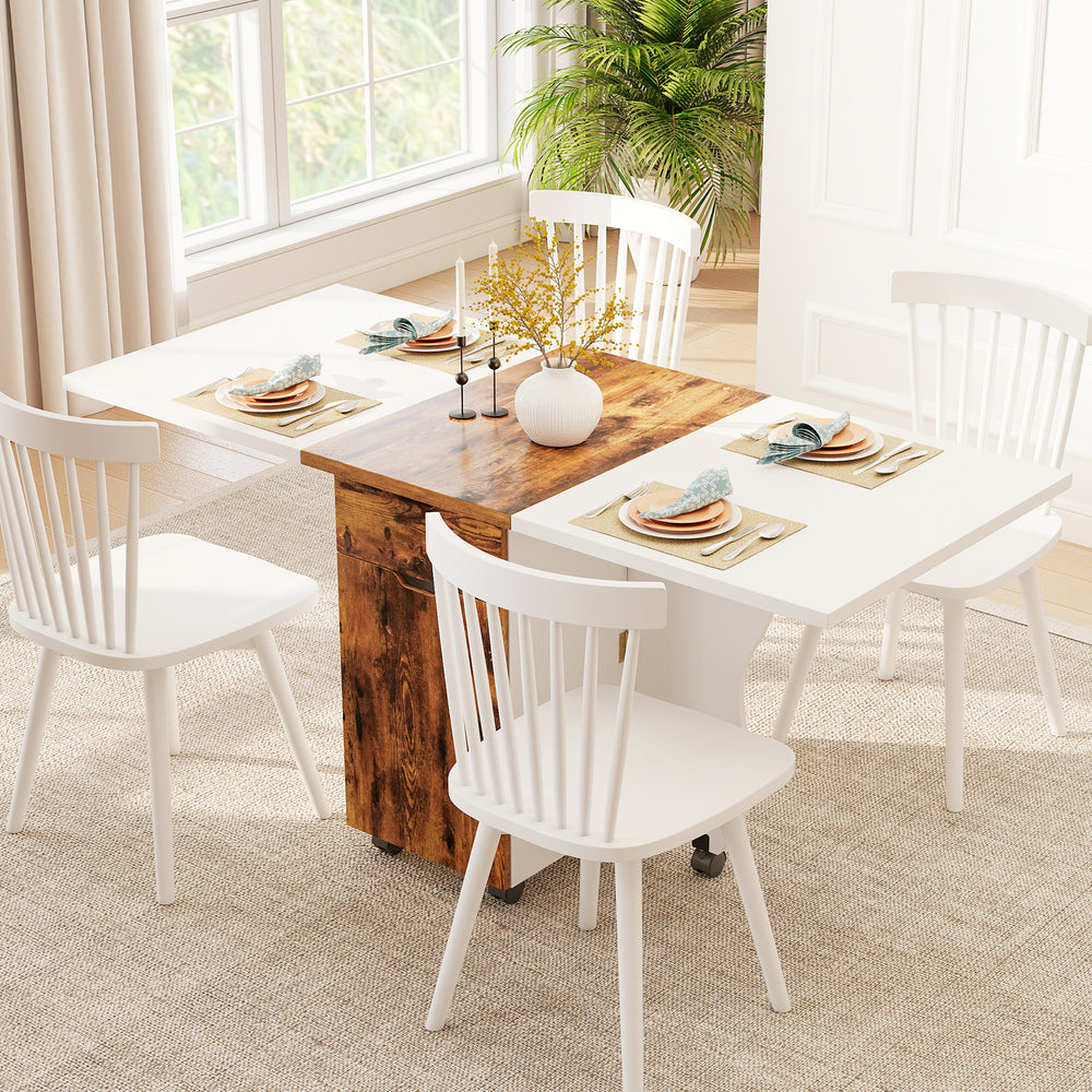 Folding dining table with a brown wood-like finish, featuring drop leaf design and lockable wheels for versatile use.