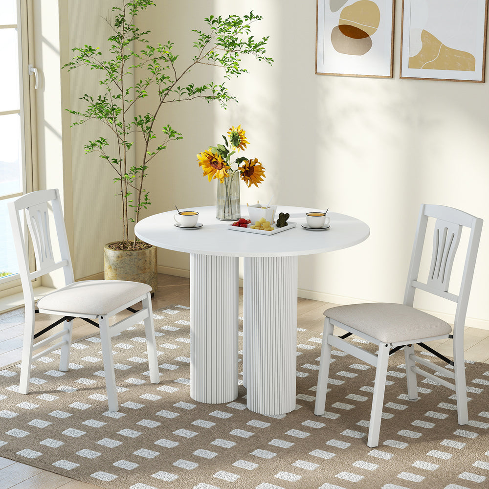 White upholstered folding dining chairs set of 2 with comfy padded seats, ideal for kitchen or dining room use.
