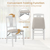 Folding kitchen chair set of 2 in white with padded seats, showcasing convenient folding function for easy storage.