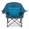 Oversized blue folding camping chair with padded seat, side pockets, and cup holder for outdoor comfort and convenience.