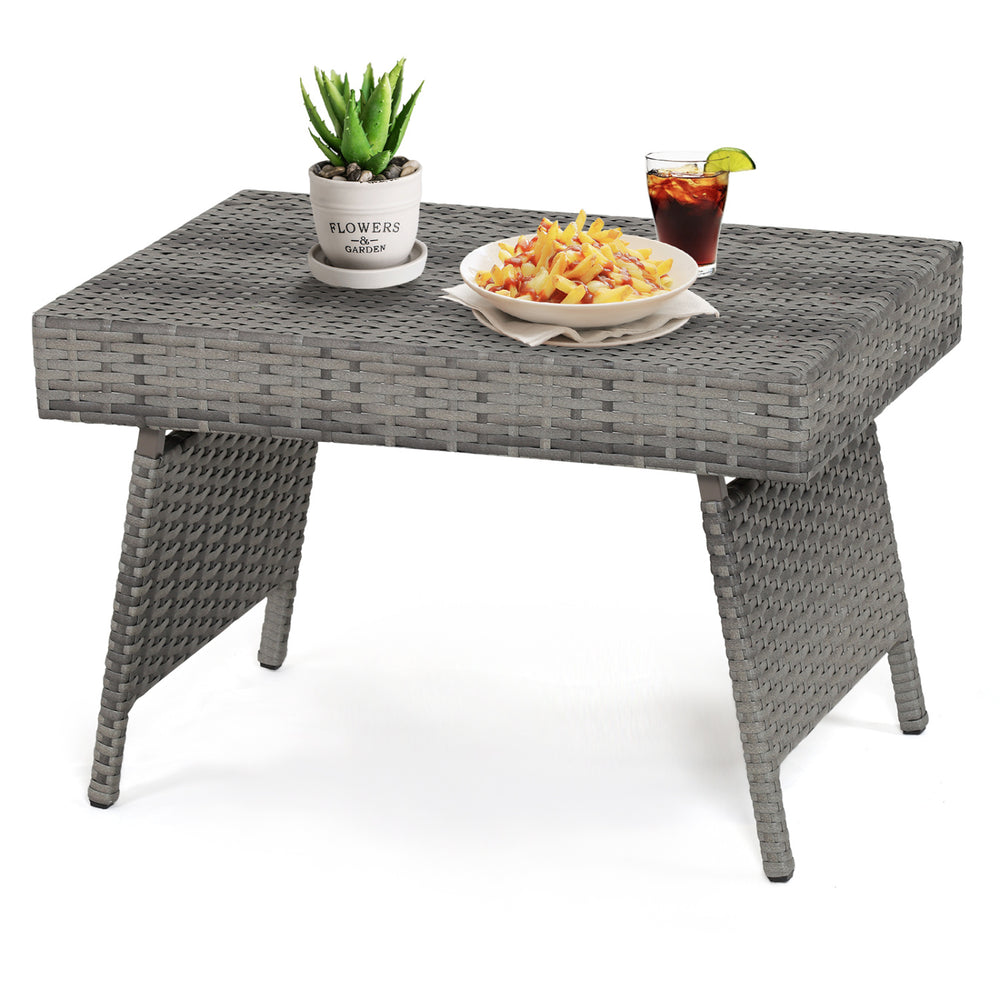 Folding gray PE rattan coffee table with wide top for outdoor use, perfect for summer drinks and snacks.