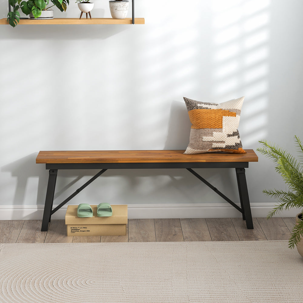 Rectangular acacia wood folding picnic bench with sturdy metal legs, ideal for indoor and outdoor seating.