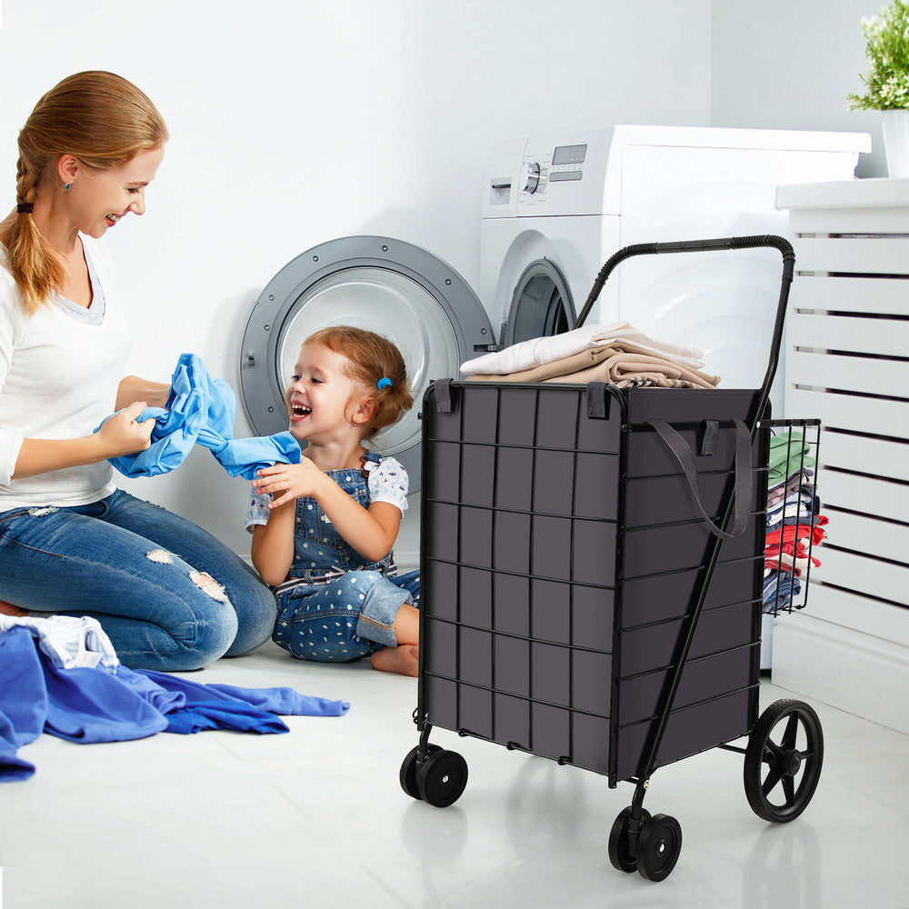 Folding rolling shopping cart in black with waterproof liner, ideal for laundry and grocery storage, shown in use.