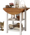 Folding round dining table with drop leaf design, acacia wood veneer, and 2 shelves for small spaces in white finish.