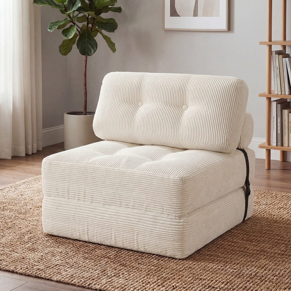 Folding sofa bed in beige with corduroy cover, featuring a pillow and back support, ideal for living room use.