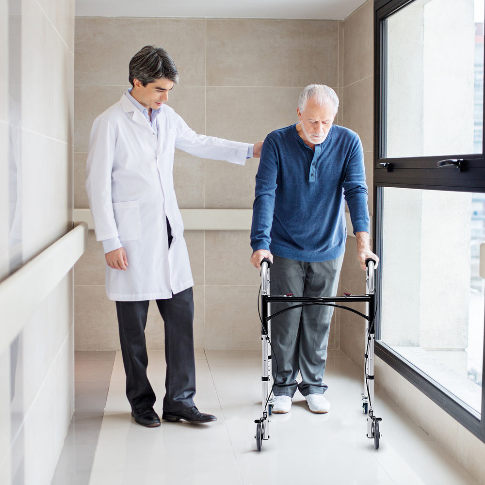 Height adjustable aluminum walker with rolling wheels and brakes, shown in use for mobility support and stability.