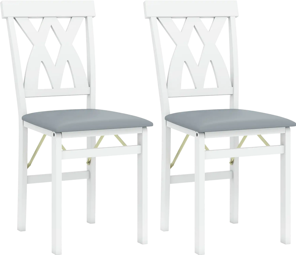 Set of 2 white folding wooden dining chairs with gray faux leather seats and X-shaped backrests for stylish comfort.