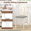 White folding wooden dining chair with soft padded cushion and X-shaped hollowed backrest for comfort and airflow.