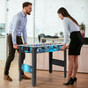 Stable soccer table game featuring two players in action, promoting fun and coordination for all ages in an office.