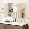 Frameless bathroom wall-mounted mirror cabinet with three mirrored doors and ample storage compartments for organized.
