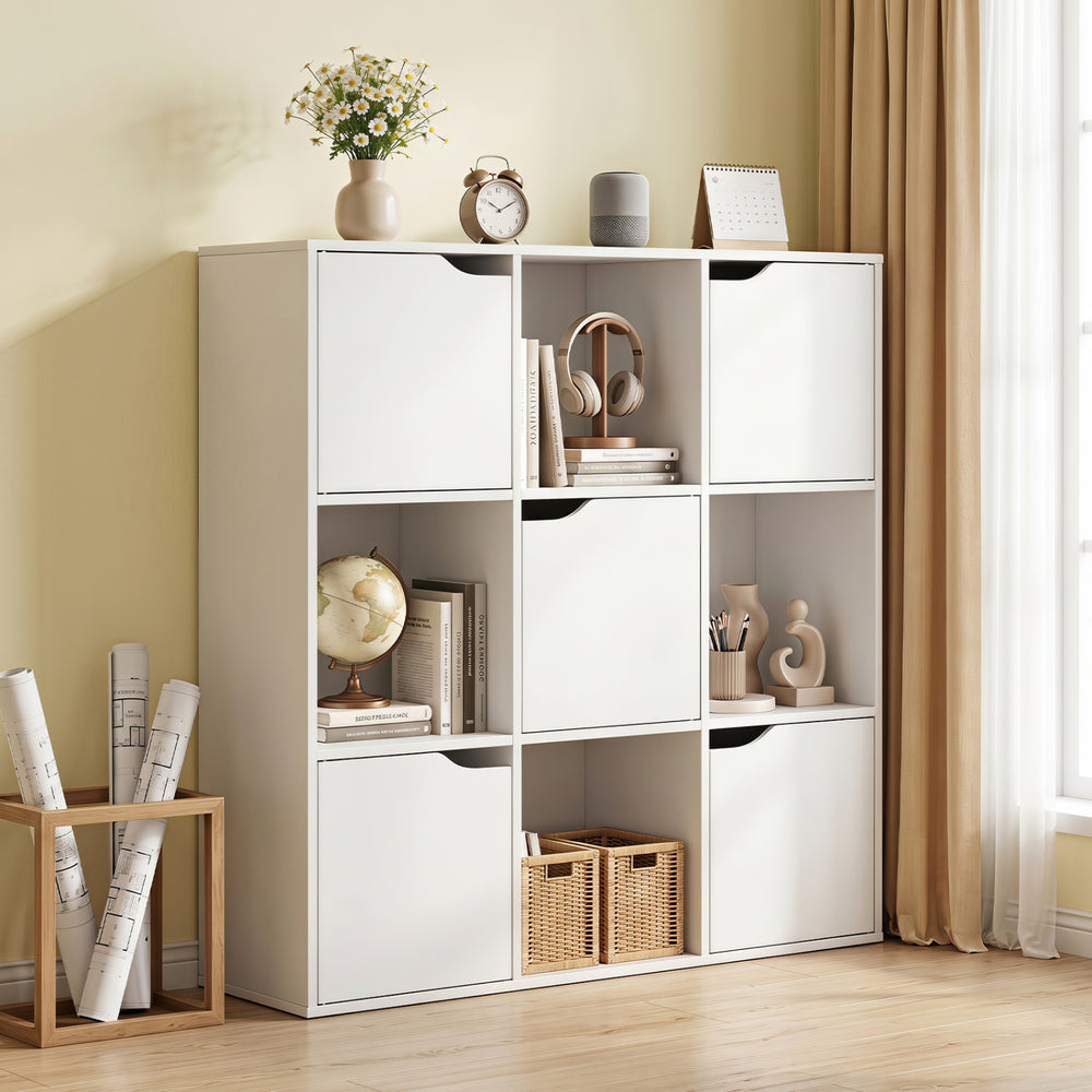 Stylish white 9-cube storage bookcase combines open and concealed spaces, perfect for maximizing storage in any room.
