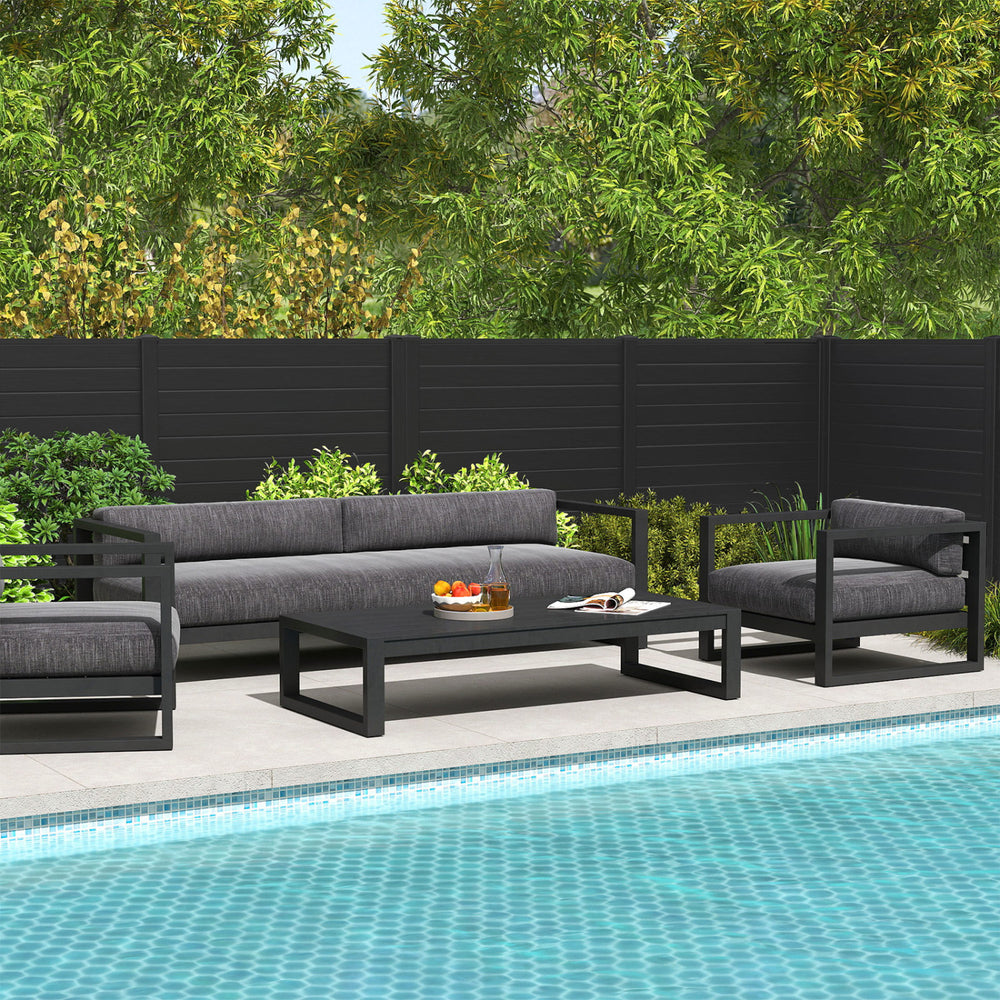 Freestanding black air conditioner fence with heavy-duty metal stakes, ideal for privacy around outdoor units and.