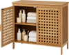 Bamboo bathroom storage cabinet with two doors, featuring ventilated hollowed-out doors and a sturdy design for towels and decor.
