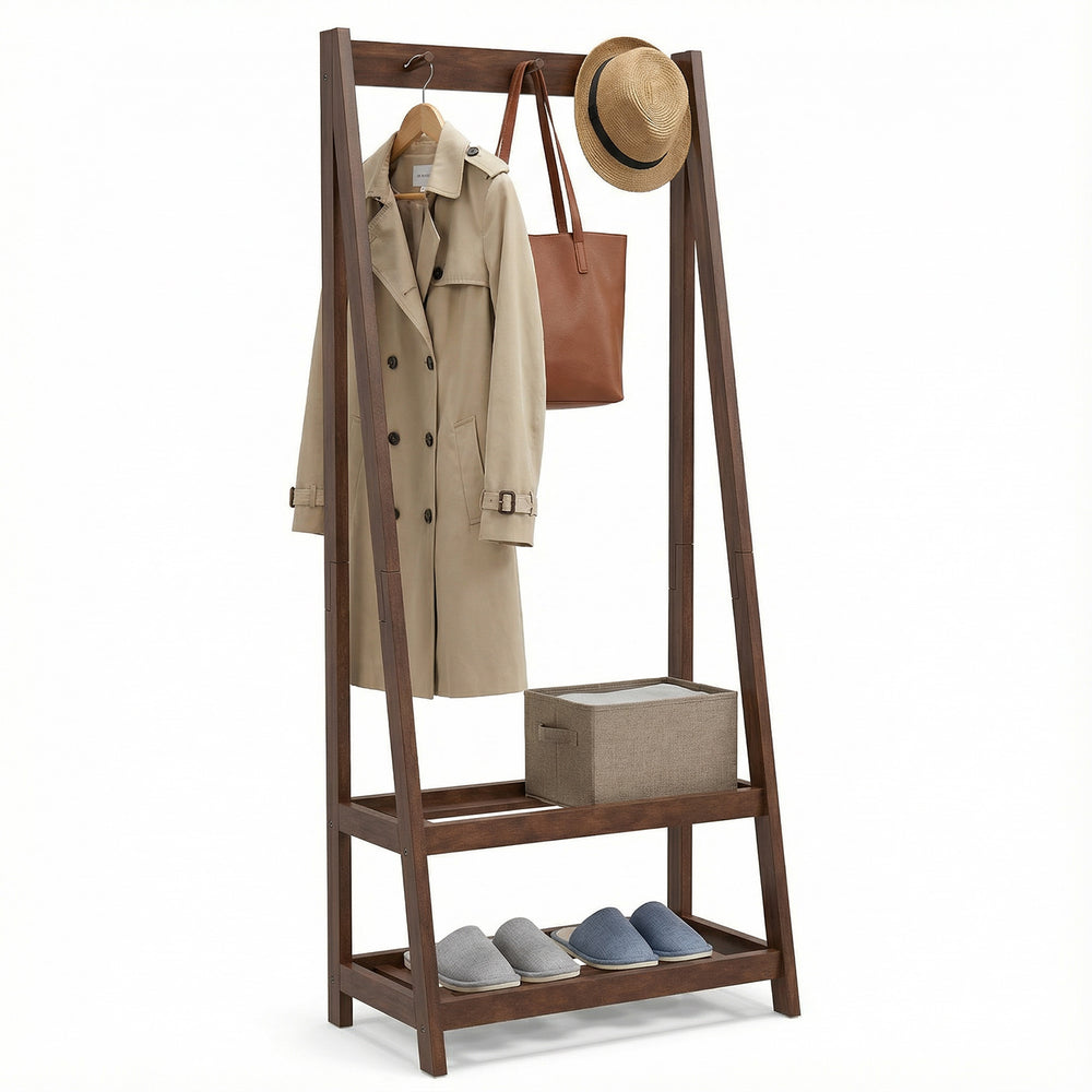 Freestanding clothes rack in walnut with 3 hooks and 2 shelves, perfect for organizing entryways and bedrooms.