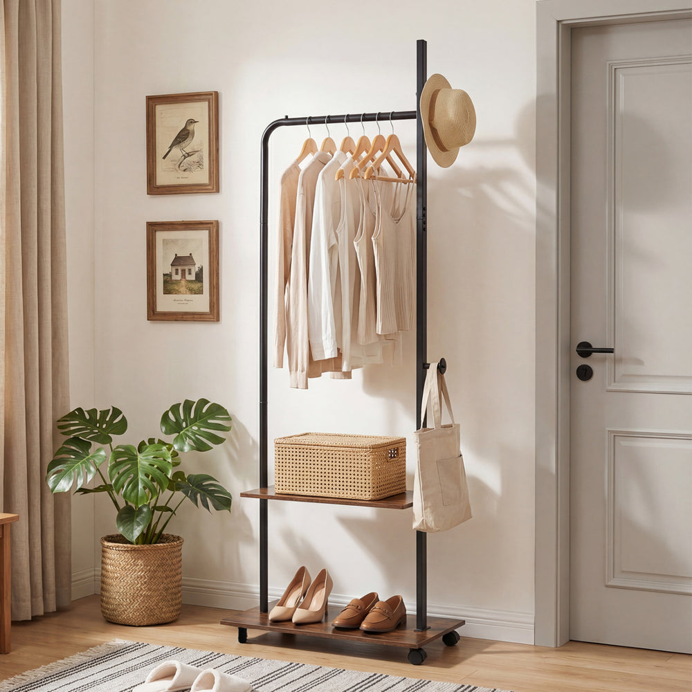 Freestanding clothing rack with wheels, rustic brown shelves, and hanging rod for stylish organization in entryway or.