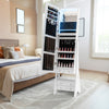 Freestanding white jewelry armoire with LED lights, full-length mirror, and 6 drawers for organized storage in a.
