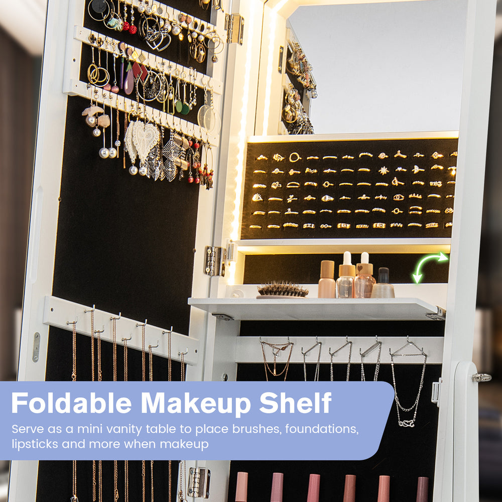 Foldable makeup shelf in a white jewelry armoire, featuring LED lights and ample storage for cosmetics and tools.