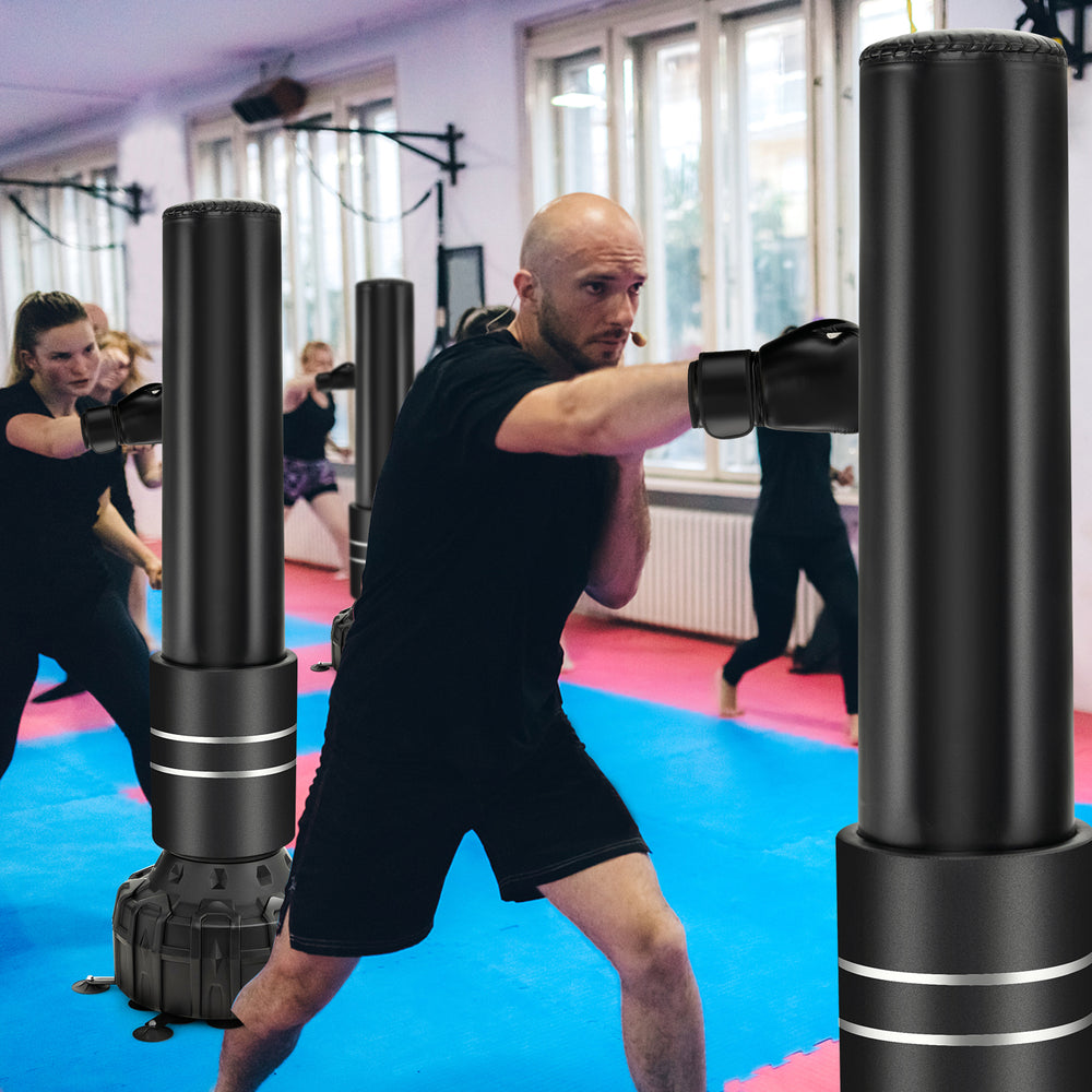 Freestanding 71-inch punching bag with 25 suction cups, designed for boxing and kickboxing training, includes gloves.