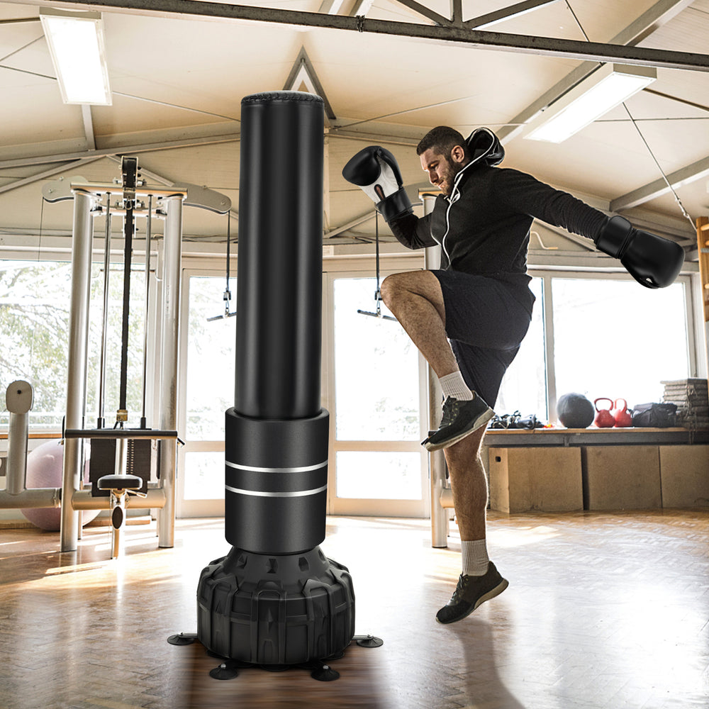 Freestanding 71-inch punching bag with 25 suction cups, ideal for boxing and kickboxing training, includes gloves.