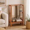 Freestanding towel rack in solid wood with three hanging bars and a bottom shelf for versatile storage in any room.