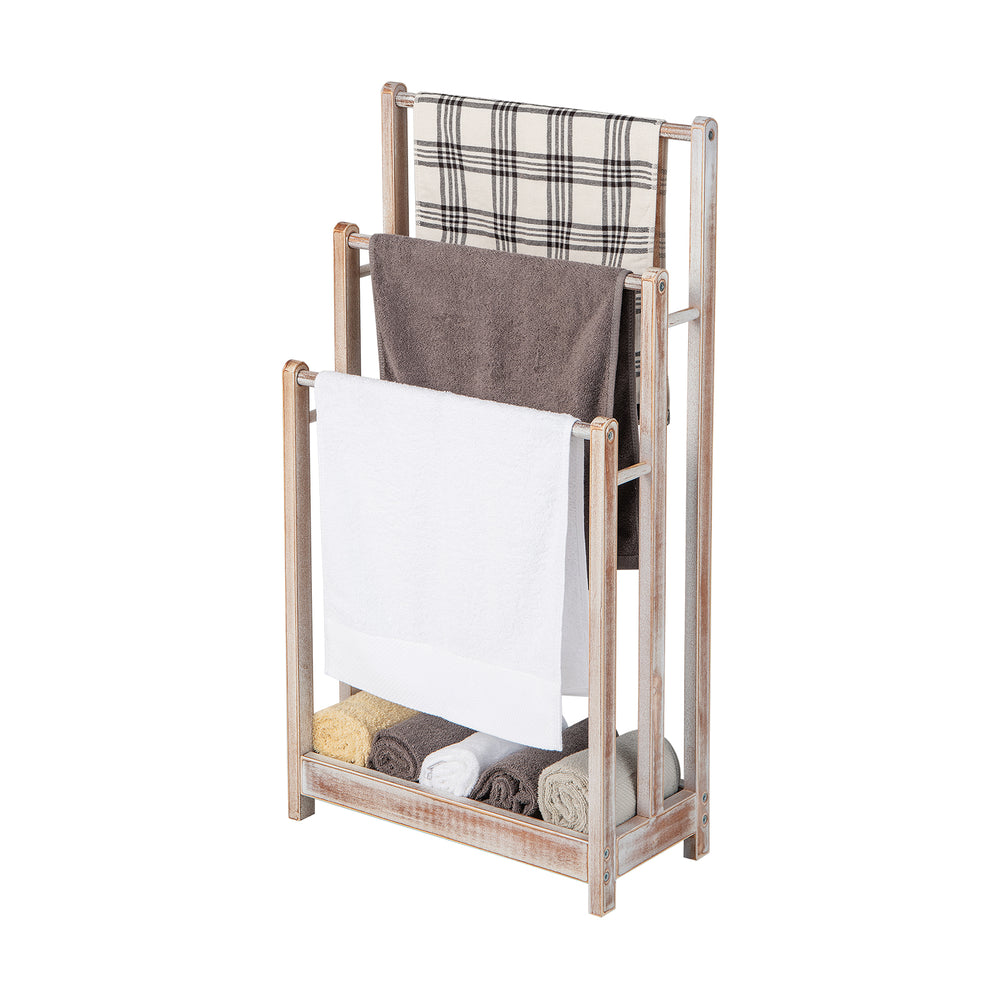 Freestanding towel rack featuring a sleek three-bar design in white, with a raised bottom shelf for additional towel.