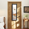 Full length mirror jewelry cabinet in black, featuring ring slots and necklace hooks, perfect for organized storage.