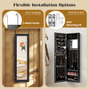 Full length mirror jewelry cabinet in black, featuring ring slots and necklace hooks, ideal for organized storage.