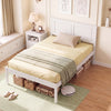 Twin size farmhouse wooden platform bed frame in white with headboard, styled with yellow bedding and decorative.