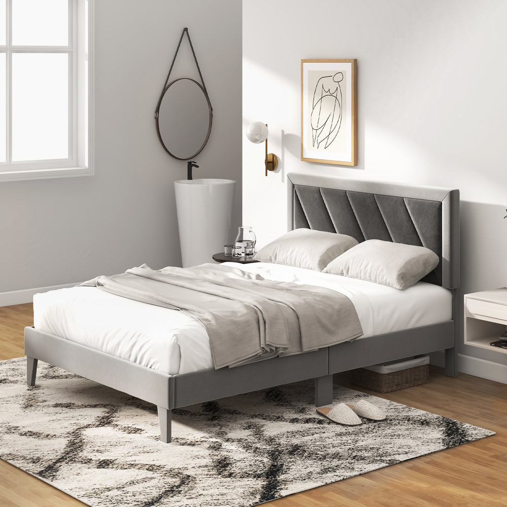 Full-size platform bed with high velvet headboard, wooden slats, and cozy design for comfortable sleeping and storage.