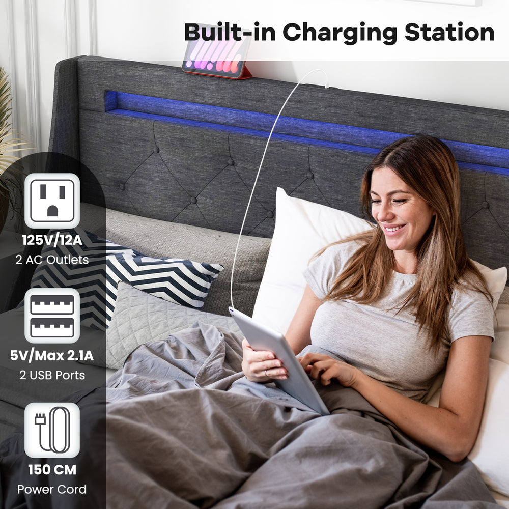 Full size bed frame in grey with LED lights, charging station, and button-tufted headboard for modern bedroom decor.
