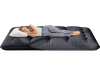 Futon mattress with washable cover, featuring a foldable design, shown in a cozy living room setting for versatile use.