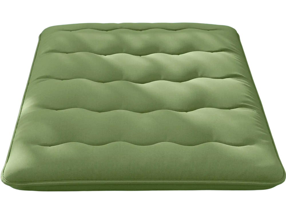 Full-size floor mattress in green with a washable cover, perfect for camping, play, or yoga, shown in a cozy indoor.