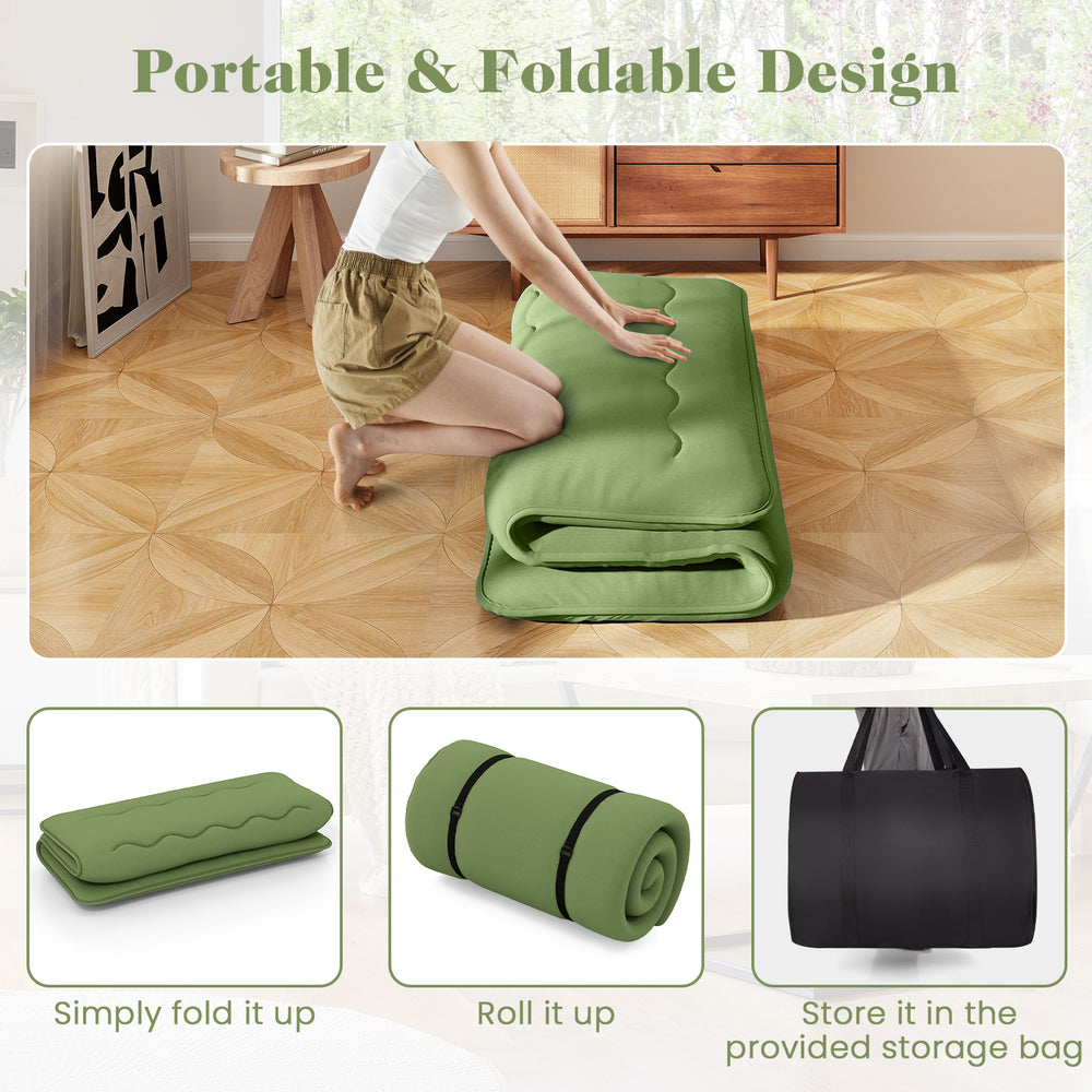 Foldable green floor mattress with washable cover, ideal for camping or yoga, shown in storage bag for easy transport.